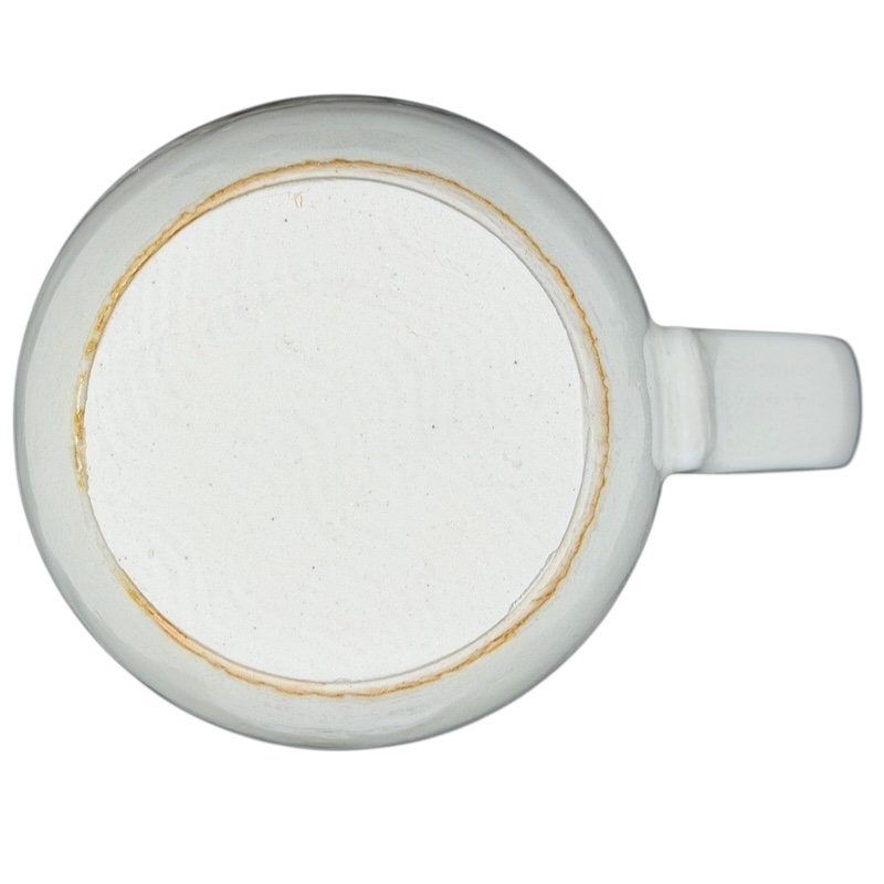 Bottom view of Otagiri vintage hummingbird flower mug showcasing its smooth white ceramic finish