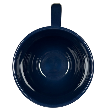 Inside view of a blue Disney mug featuring the Pandora Na'vi River Journey design