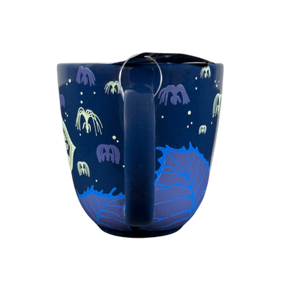 Pandora Na'vi River Journey Disney mug featuring vibrant bioluminescent designs on a dark background