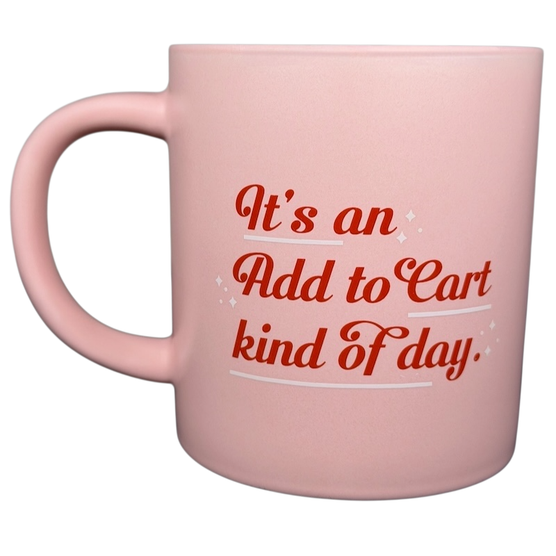 Pink ceramic mug with the phrase It's an Add to Cart kind of day in stylish typography