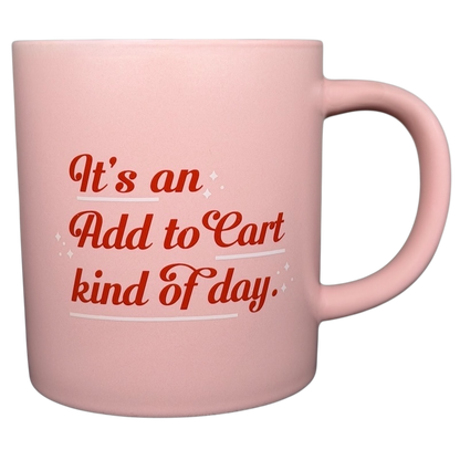 Pink mug with the phrase 'It's an Add to Cart kind of day' in stylish lettering