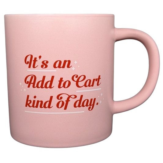 Pink mug with the phrase 'It's an Add to Cart kind of day' in stylish lettering