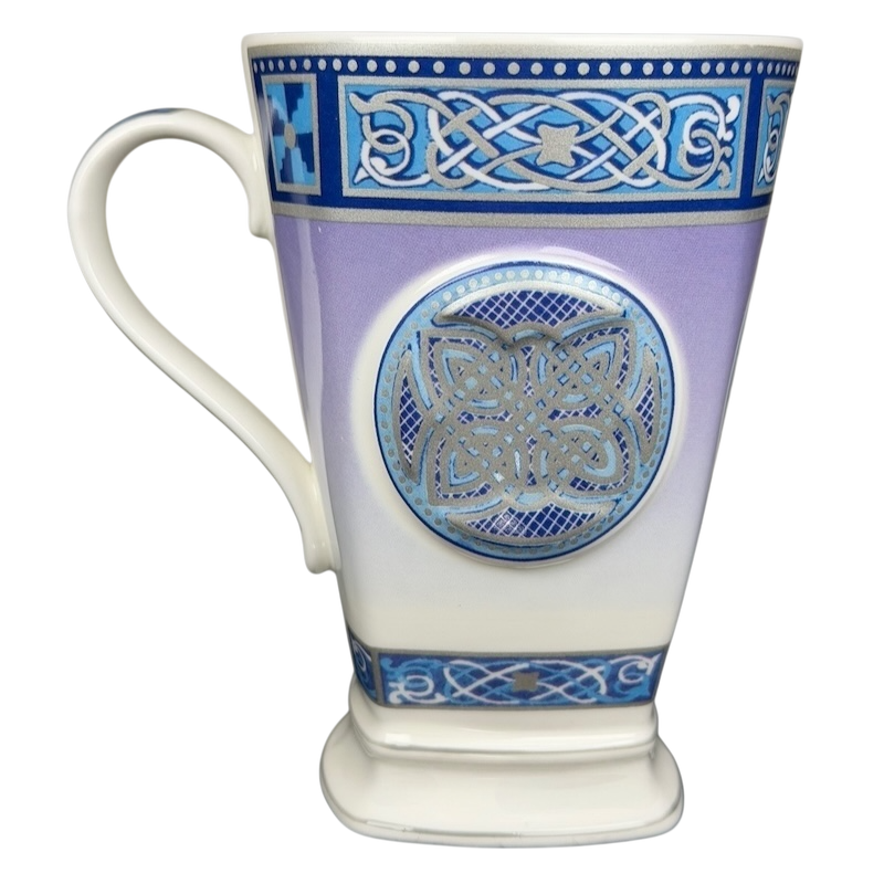 Celtic mug Past Times collectible with intricate blue and silver Celtic knot design