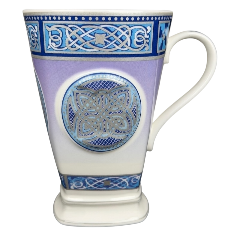 Elegant Celtic mug Past Times collectible featuring intricate blue designs and a unique shape