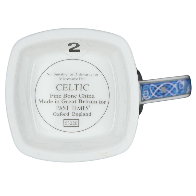 Bottom view of a Celtic mug Past Times collectible made of fine bone china, showcasing label details.