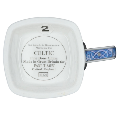 Bottom view of a Celtic mug Past Times collectible made of fine bone china, showcasing label details.