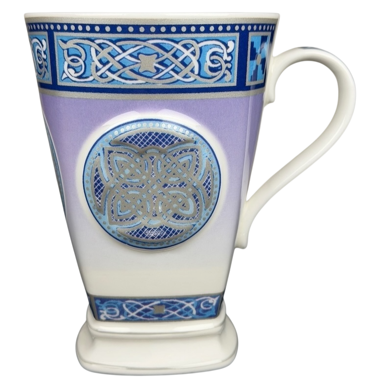 Celtic mug Past Times collectible featuring intricate blue and silver designs