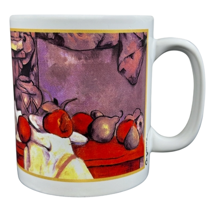 Paul Cezanne still life Cafe Arts vintage mug featuring colorful fruit design on a white background