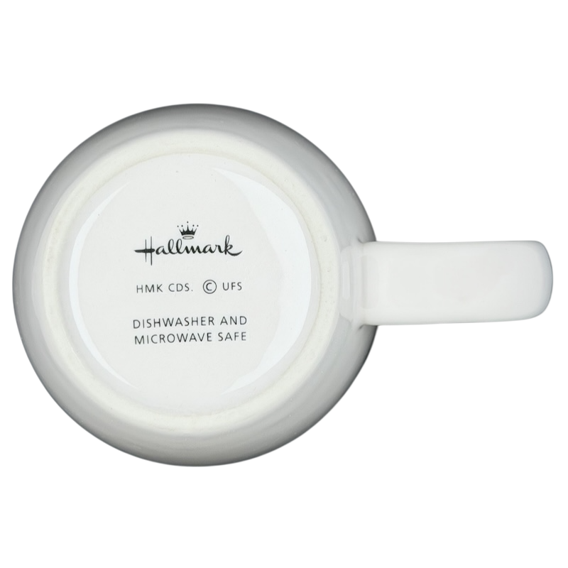 Bottom view of Hallmark Peanuts Charlie Brown Snoopy vintage mug with care instructions