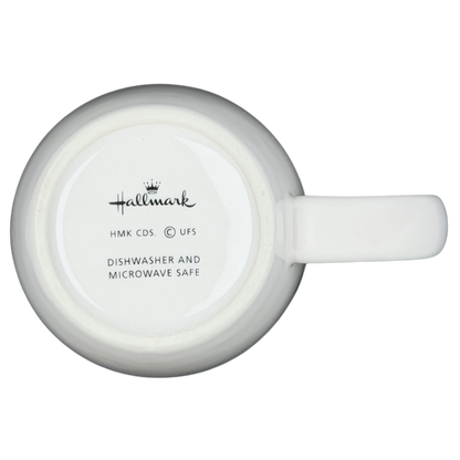 Bottom view of Hallmark Peanuts Charlie Brown Snoopy vintage mug with care instructions