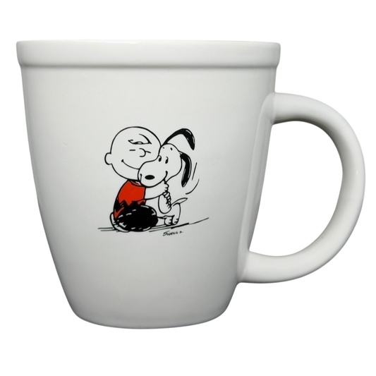 Hallmark Peanuts Charlie Brown Snoopy vintage mug featuring Charlie and Snoopy in a sweet embrace