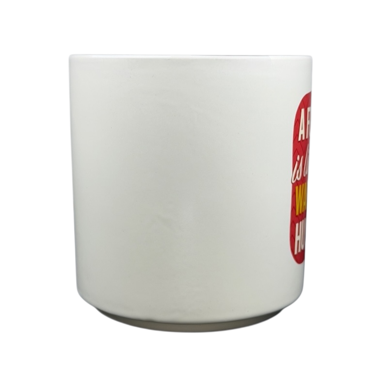 Peanuts Movie Charlie Brown Snoopy Hallmark mug with a heartfelt quote displayed on a red background