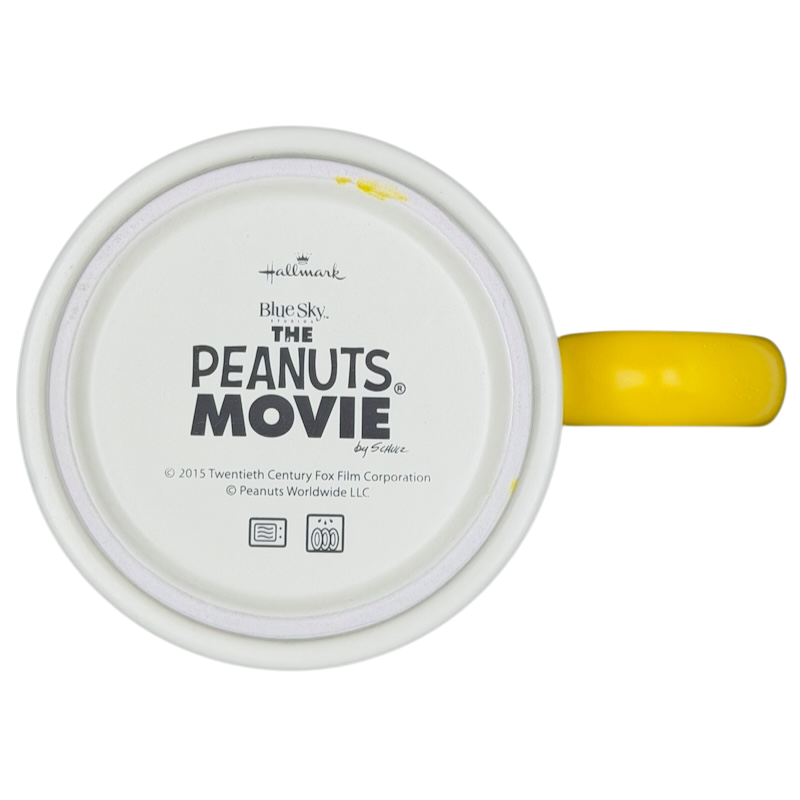 Top view of a Hallmark mug featuring Peanuts Movie Charlie Brown Snoopy design with a yellow handle