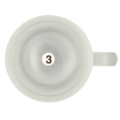 Top view of Pebble Beach 100th U.S. Open 2000 Commemorative Frosted Glass Mug with a number three inside