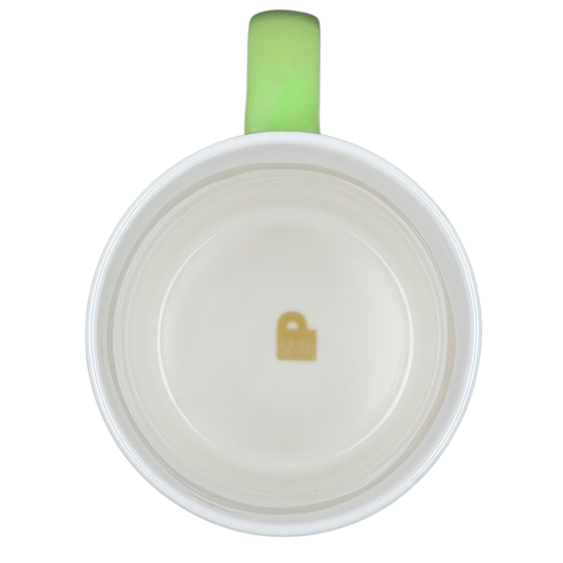 Top view of Peet's Coffee Insider Oakland mug featuring a green handle and an embossed logo
