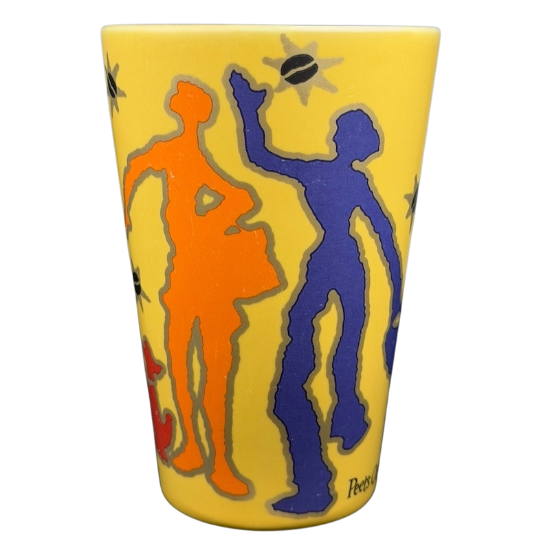 Peet's Coffee & Tea Tall Latte Mug with colorful silhouette designs on a yellow background