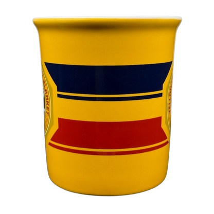 Pendleton Woolen Mills Yellowstone collectible mug in vibrant yellow with colorful geometric patterns