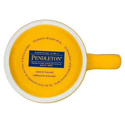 Pendleton Woolen Mills Yellowstone collectible mug in bright yellow with iconic logo on the bottom