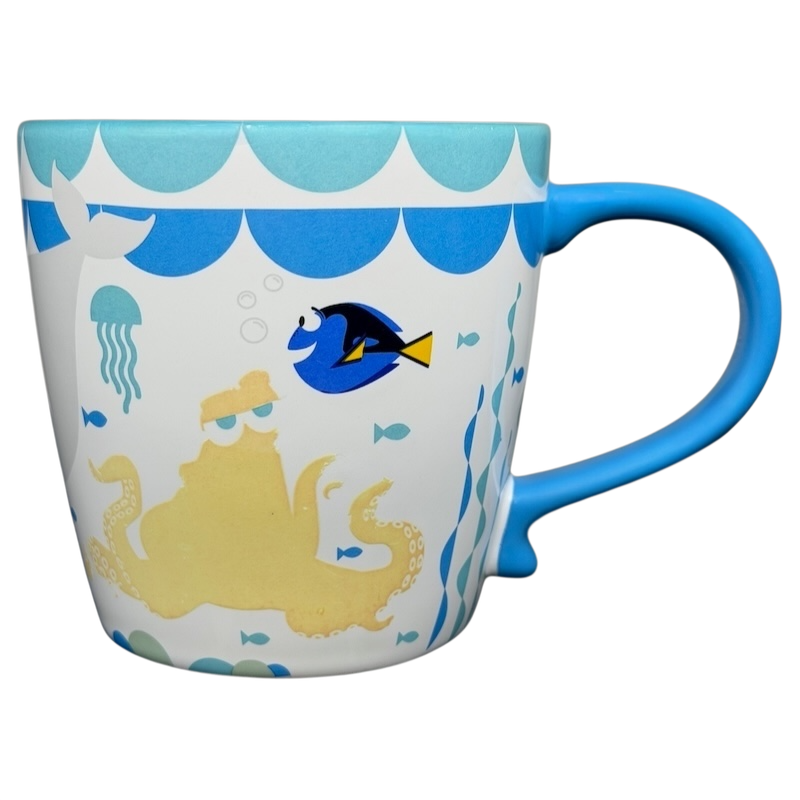 Finding Dory Mug Pixar Disney Store featuring Dory and an octopus design in vibrant colors