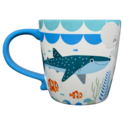 Finding Dory Mug Pixar Disney Store featuring colorful ocean characters and vibrant designs