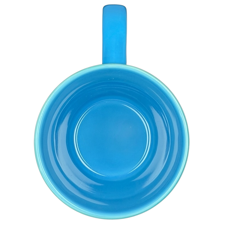 Bright blue Finding Dory Mug Pixar Disney Store with a comfortable handle for everyday use