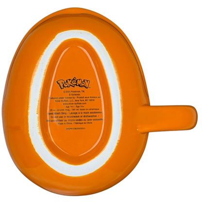 Bottom view of a Pokemon Charmander Mug featuring a bright orange design and official branding