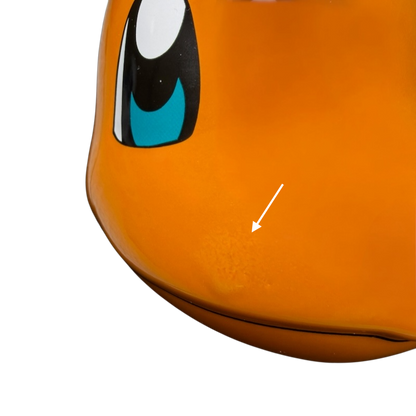 Close-up of the Pokemon Charmander Mug showcasing vibrant colors and playful character design
