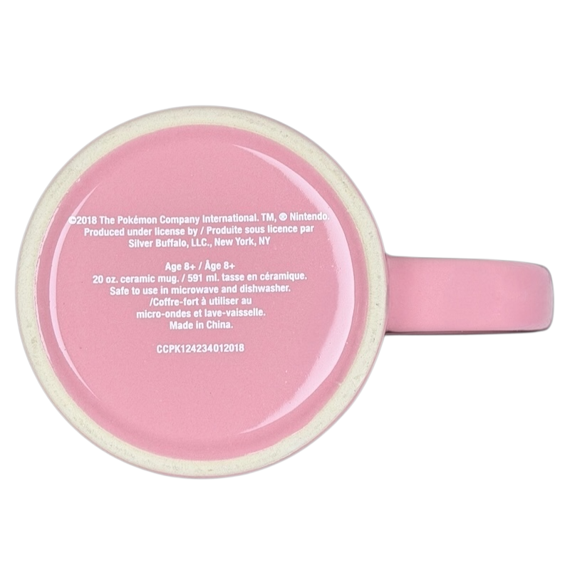 Bottom view of a pink Pokemon Jigglypuff mug featuring ceramic construction and care instructions