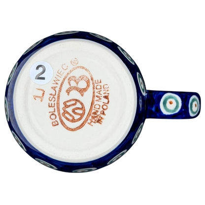 Bottom view of Polish pottery blue peacock eye mug showcasing the artisan craftsmanship and markings