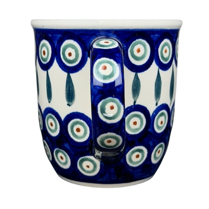 Polish pottery blue peacock eye mug with vibrant circular patterns and a sturdy handle
