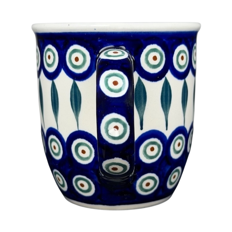Polish pottery blue peacock eye mug featuring intricate designs and a sturdy handle