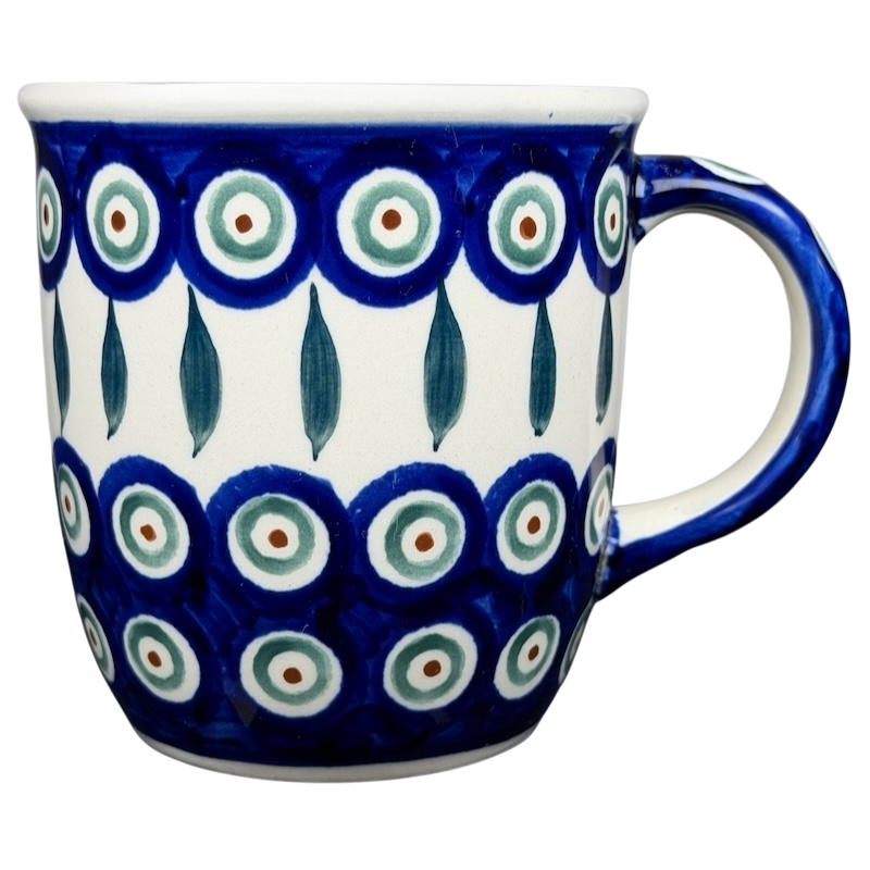 Polish pottery blue peacock eye mug featuring intricate designs and vibrant colors for coffee lovers