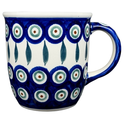 Polish pottery blue peacock eye mug featuring intricate designs and vibrant colors for coffee lovers
