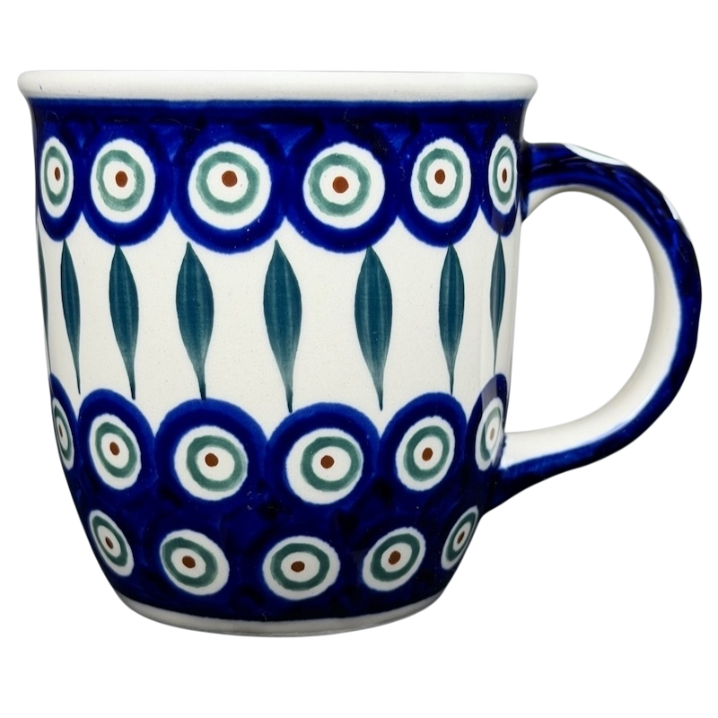 Polish pottery blue peacock eye mug featuring colorful eye designs and a classic handle