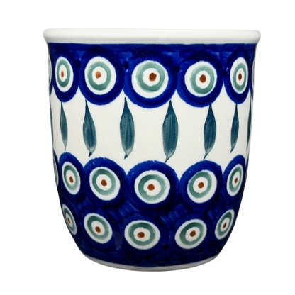 Polish pottery blue peacock eye mug featuring intricate blue and green patterns