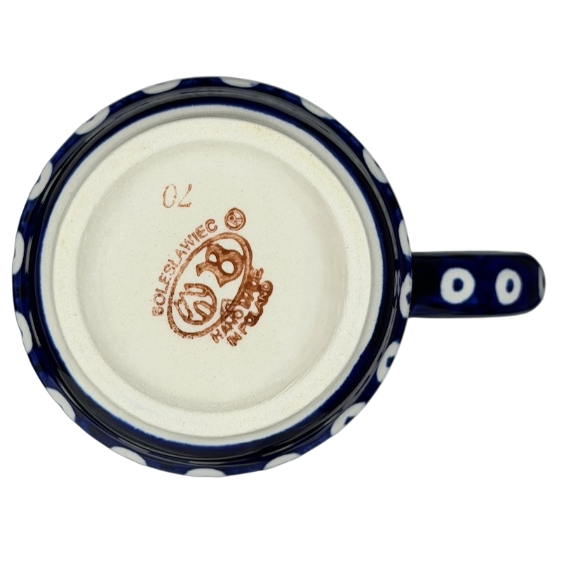 Underside view of Polish Pottery Bolesławiec American School Warsaw Mug featuring stamped design