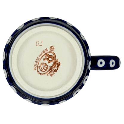 Underside view of Polish Pottery Bolesławiec American School Warsaw Mug featuring stamped design