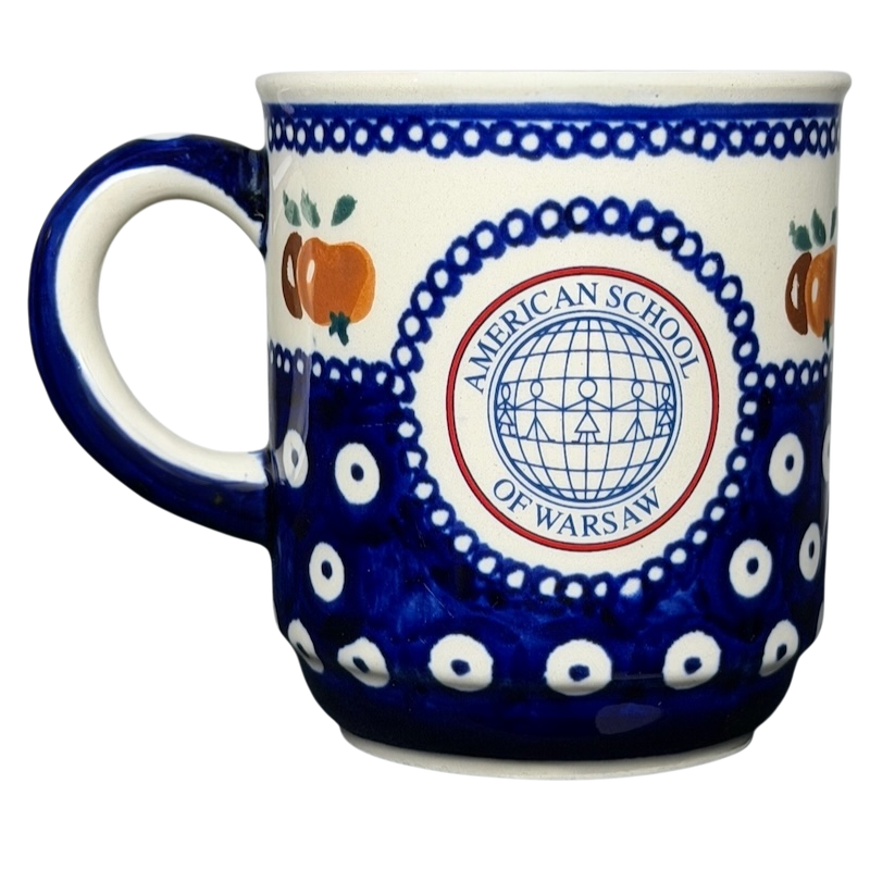 Polish Pottery Bolesławiec American School Warsaw Mug with decorative blue and orange patterns
