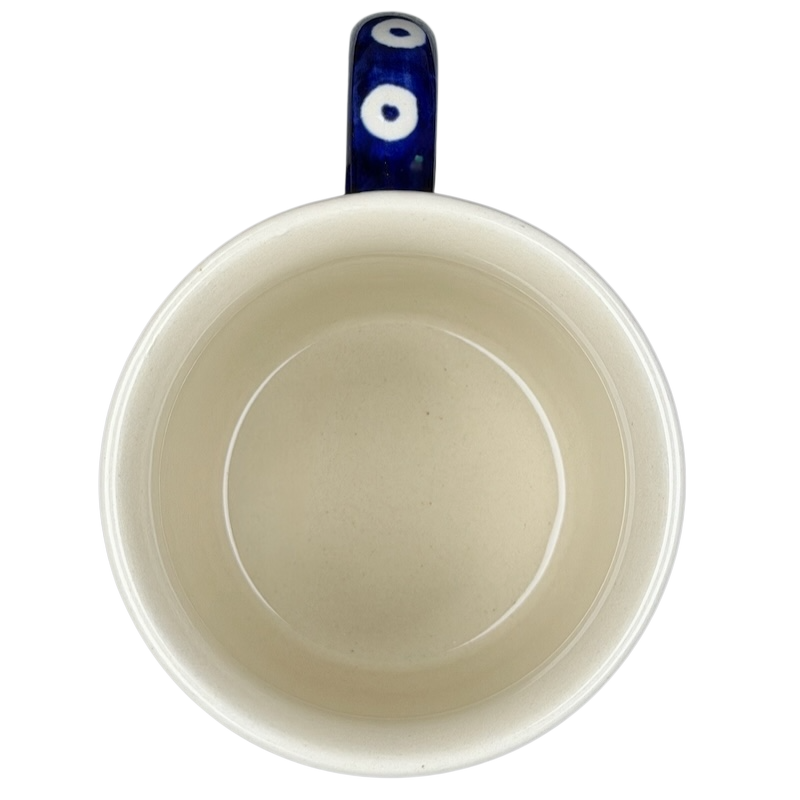 Top view of Polish Pottery Bolesławiec American School Warsaw Mug with a blue patterned handle