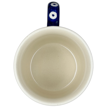 Top view of Polish Pottery Bolesławiec American School Warsaw Mug with a blue patterned handle