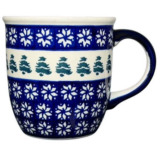 Polish Pottery Boleslawiec Christmas Tree Snowflake Mug featuring blue snowflake designs on a white background