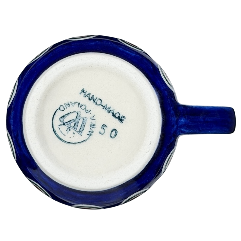 Bottom view of Polish Pottery Boleslawiec Floral Circle Dot Mug showcasing handmade detail and authentic craftsmanship
