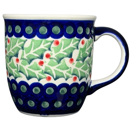 Polish Pottery Boleslawiec Holly Berry Christmas Mug featuring vibrant holly designs and blue patterns