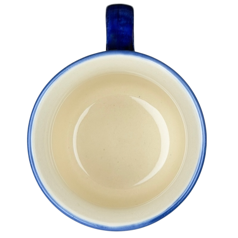 Interior view of Polish Pottery Daisy Floral Boleslawiec Mug showcasing its smooth finish and elegant design