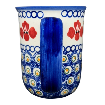 Polish Pottery Red Floral and Peacock Eye Boleslawiec mug with vibrant patterns and a sturdy handle