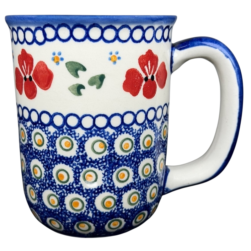 Polish Pottery Red Floral and Peacock Eye Boleslawiec mug with vibrant colors and intricate design