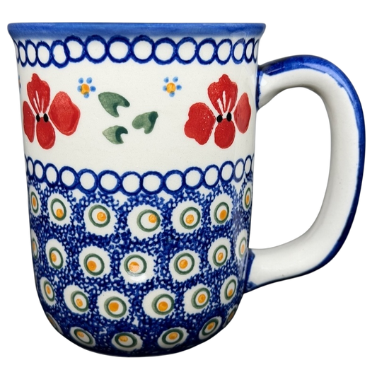 Polish Pottery Red Floral and Peacock Eye Boleslawiec mug with vibrant colors and intricate design