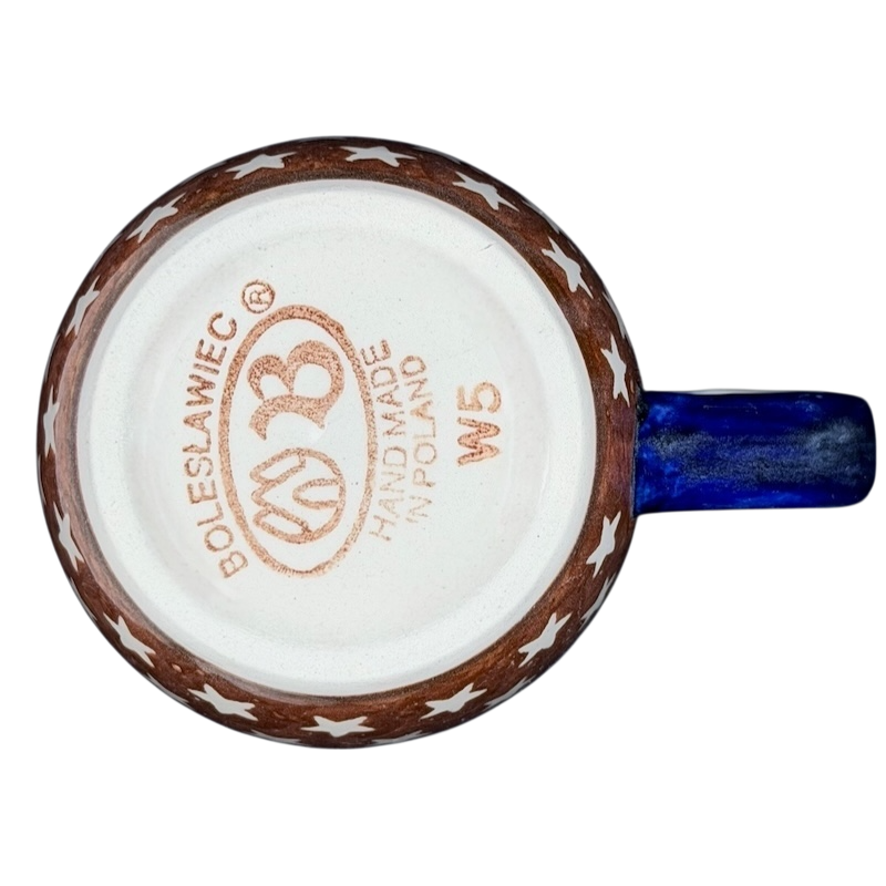 Underneath view of Polish Pottery Star Spangled Mug with brown and blue star pattern and Bolesławiec stamp