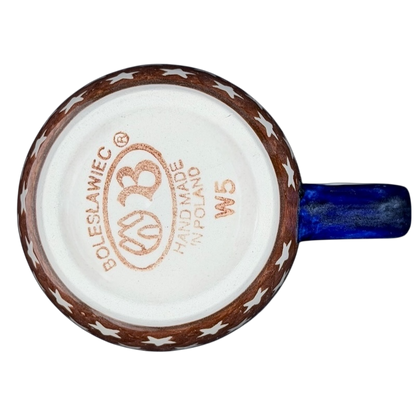 Underneath view of Polish Pottery Star Spangled Mug with brown and blue star pattern and Bolesławiec stamp