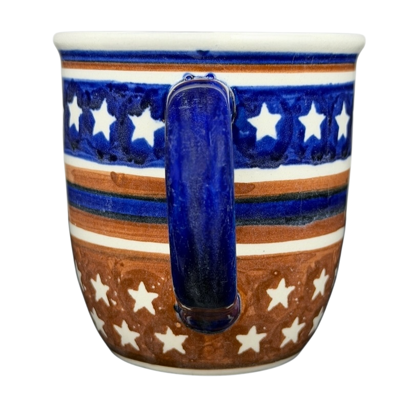 Polish Pottery Star Spangled Mug with a colorful star and stripe design for festive occasions